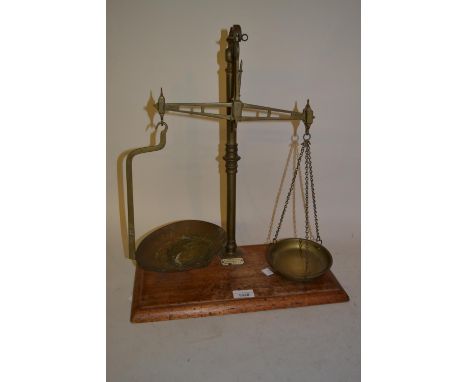 Pair of 19th / 20th Century brass and mahogany based balance scales 