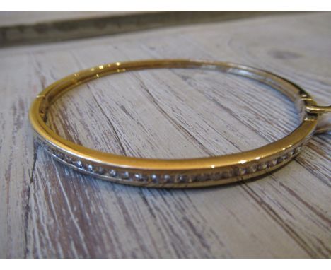 9ct Yellow gold diamond set bangle, approximately 1ct total 