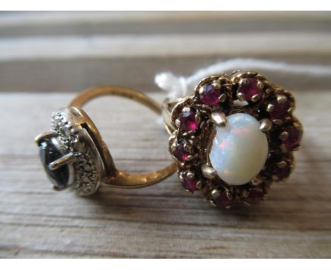 9ct Gold sapphire and diamond dress ring together with a 9ct gold opal and garnet dress ring 