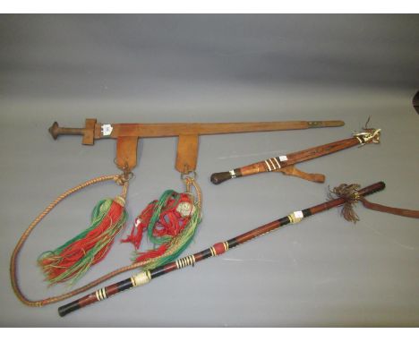 African Takouba sword with leather scabbard together with a similar dagger and a shaman stick 