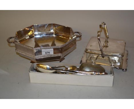 Silver plated butter dish with swing handle and glass liner, octagonal two handled fruit dish with Celtic design rim and a sm