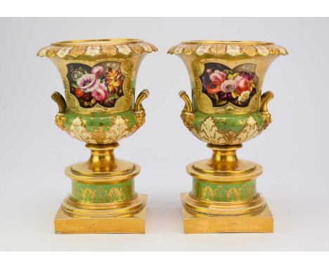 H&amp;R Daniel - A pair of pot pourri vases, circa 1822-25lacking covers, of campagna type with twin mask handles, raised on 