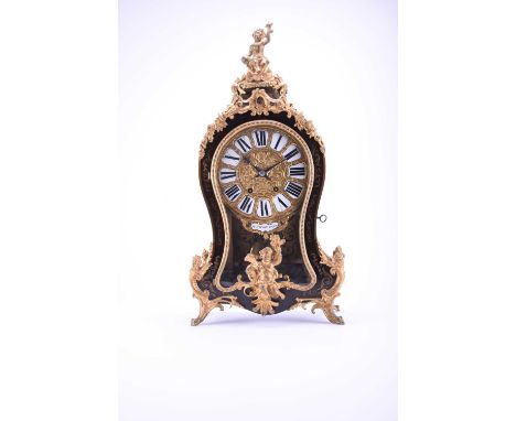 A Louis XV style gilt metal mounted boulle bracket clock, 19th centuryThe dial with plaque inscribed 'Martinot A Paris'The 7 