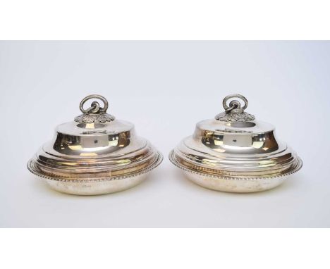 A pair of George III Paul Storr silver entree dishes and covers, Paul Storr, London 1807, each of circular form with gadroone