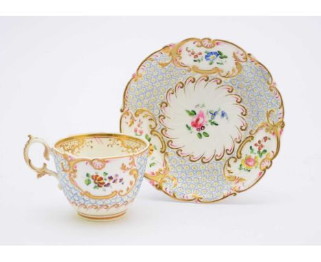 H&amp;R Daniel - A 'Mayflower' teacup and saucer, circa 1828-30pattern 4630, of moulded form with florets edged in pale blue,