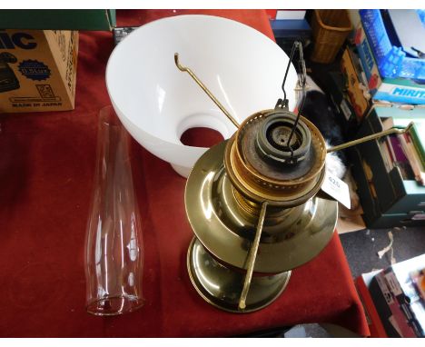 Oil Lamp. Aladdin 23, modern. Measures approx 24". Made by Aladdin. Metal stand and base with 2 piece glass top. Good conditi