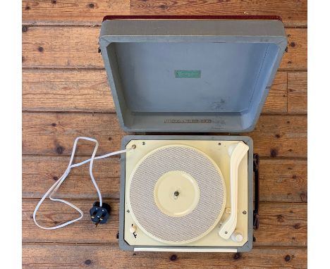 Vintage 1950s Portable Record Player. A Marconiphone 4-speed portable record player with built-in amp, maroon and grey colour