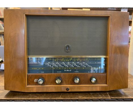 A vintage Pye AM/FM/Long Wave AC radio receiver from 1955in an attractive light wooden case 9 valves plus rectifier and tunin