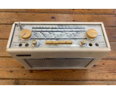 VINTAGE TRANSISTOR RADIO. A Hacker 'Sovereign II' portable transistor radio from late 1960s. Top controls and display, and an