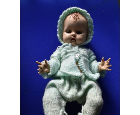 Dolls and Teddy Bear. 2 x vintage articulated limb baby dolls with opening eyes: 'Rosebud' made in England, with hair and ope