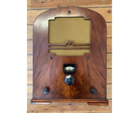 RARE VINTAGE TABLETOP RADIO. A rare 1934 'cathedral-style' tabletop battery receiver, made by Marconi. Attractive domed woode