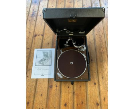 A vintage HMV Portable Gramophone. A vintage portable wind-up gramophone by His Master's Voice, circa 1931. In excellent cond