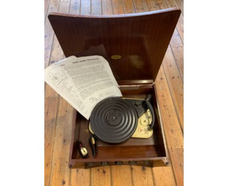 An EMI/Capitol Vintage Gramophone. A Capitol RS101 tabletop gramophone circa 1959 with Garrard deck. Wooden casing with fold-