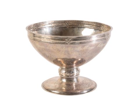 ARTS AND CRAFTS PEDESTAL BOWL, by A.E. Jones, Birmingham, 1909, circular form with spot hammered decoration, engraved with a 