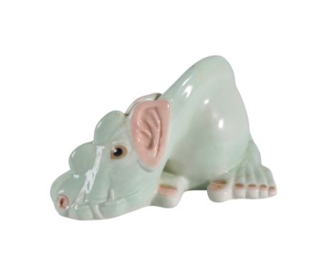 WADE: A "BABY SCRUPLE" CERAMIC GLAZED MODEL, designed by A.G Fiddes Watt, printed marks, 13.5cm long  Condition Report: 