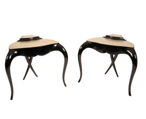 •CHRISTOPHER GUY: A PAIR OF CONTEMPORARY BLACK LACQUER CONSOLE TABLES, the shaped top with raised platform with stylised meta
