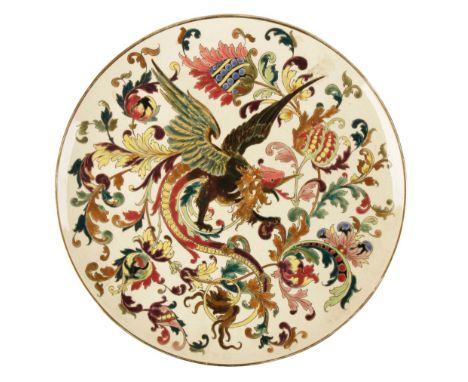 ZSOLNAY PECS: A POLYCHROME CHARGER, circular form, decorated with a phoenix amongst foliate tendrils with gilt highlights, im