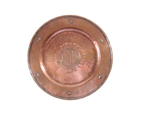 IN THE MANNER OF KESWICK: ARTS AND CRAFTS COPPER CHARGER, circular form, embossed and planished decoration, "Rhos on Sea Golf