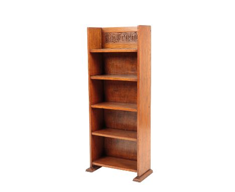 ARTS AND CRAFTS OAK BOOKCASE, with five graduated open shelves, carved to back "My Friends" raised on shaped feet, 99cm high 