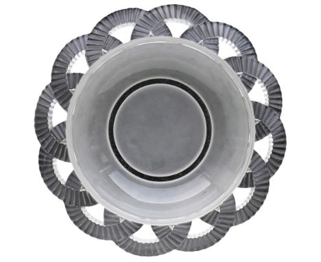 •PIERRE D'AVESN FOR VERLYS: A "COLLERETTE COUP" GLASS CHARGER, circular form, wide sloping interlaced cog wheel rim band, mou