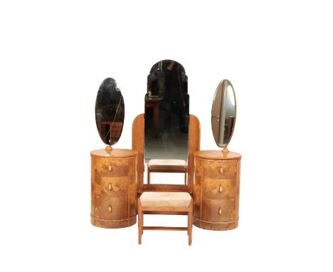 ART DECO BURR WALNUT DRESSING TABLE SUITE, comprising two pedestals each of cylindrical form, the tops each mounted with an o