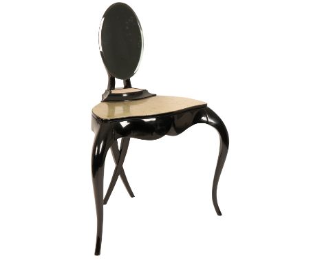 •CHRISTOPHER GUY: A CONTEMPORARY BLACK LACQUER DRESSING TABLE AND MIRROR, the shaped top with raised platform with stylised m