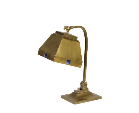 ART DECO ADJUSTABLE BRASS TABLE LAMP, the square shade inset with four tinted blue glass panels, on a curved stem, shaped rec