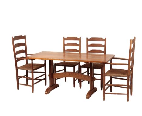 •ROBIN NANCE (1907 - 1990): A ST IVES SCHOOL ELM DINING SUITE, comprising dining table, two carvers, four chairs and a sidebo