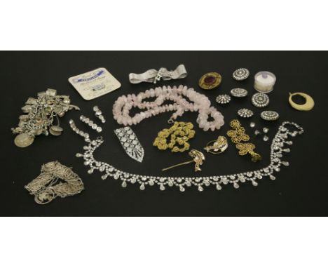 A silver charm bracelet, with a quantity of charms, a single opal tripet, a rose quartz necklace, a paste stone bracelet, etc