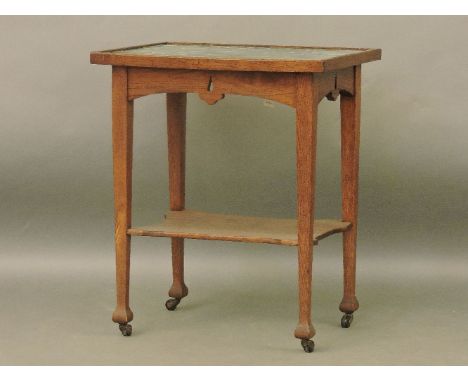 An Arts and Crafts tile top oak occasional table, 53cm wide, 49cm deep