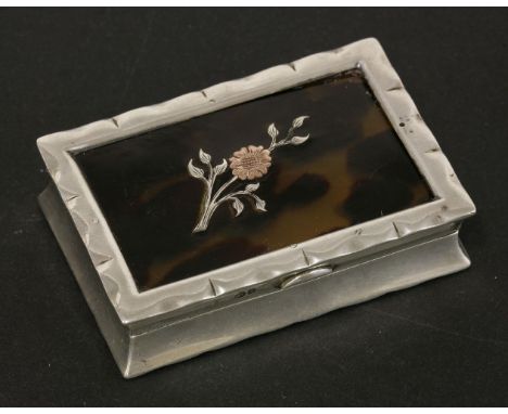 A silver and tortoiseshell lid snuff box, of rectangular form with pique work floral spray, Birmingham, 1906, Levi & Salaman