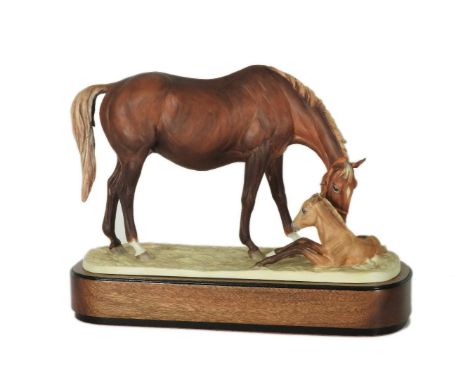 A Royal Worcester Horse and Foal Group, 'The New Born' modelled by Doris Lindner 163/500, 23cm high