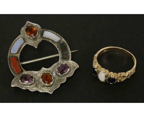 A 9ct three stone sapphire and opal ring, and a Scottish silver citrine and amethyst agate brooch