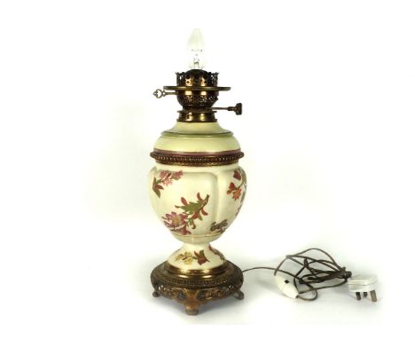A plush ivory vase, probably Worcester, with gilt metal mounts and decorated with floral sprays, converted for use as a lamp,