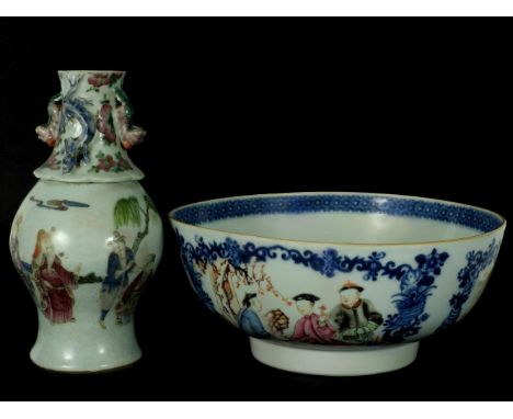 A Chinese famille rose bowl, 18th century, painted with panels of landscape or figures in a garden, fully restored, 26cm diam