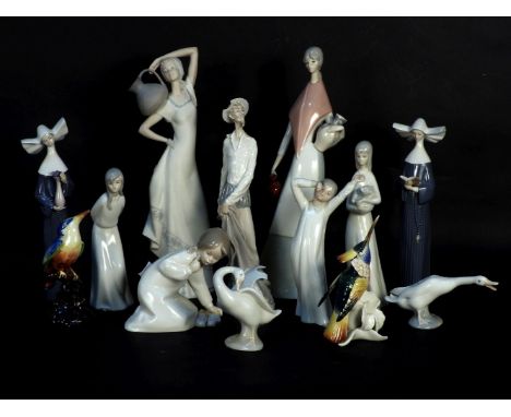 A collection of Lladro and other porcelain figures (13)