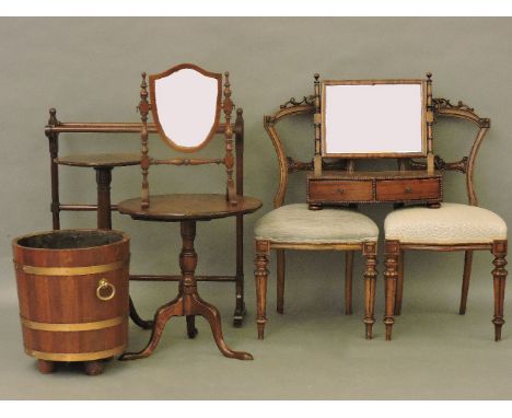 A pair of Victorian carved walnut bedroom chairs, two tripod tables, two swing dressing mirrors and a towel rail