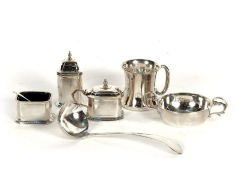 A silver porringer, three piece cruet, ladle, and tankard