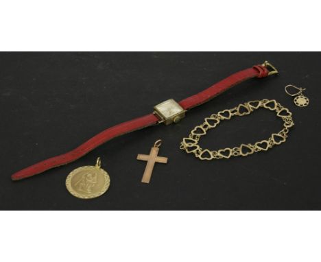 A ladies 9ct gold Rotary mechanical strap watch, a 9ct gold St Christopher pendant, a 9ct gold cross, a 9ct gold heart link b