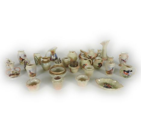 A collection of Locke and Co Worcester vases and condiments, most painted with birds, other pieces with moulded bodies