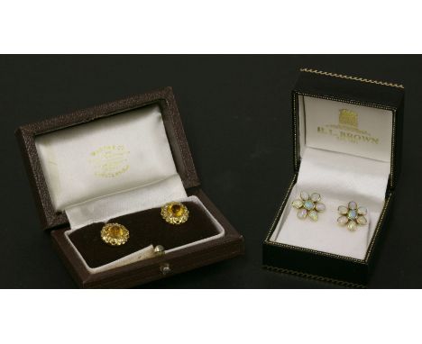 A pair of gold yellow paste stone earrings, and a pair of gold opal cluster earrings (tested as approximately 18ct gold with 