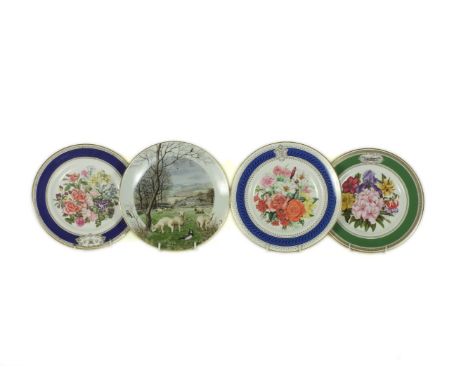 A collection of Royal Worcester and Franklin mint collectors plates, months of the year
