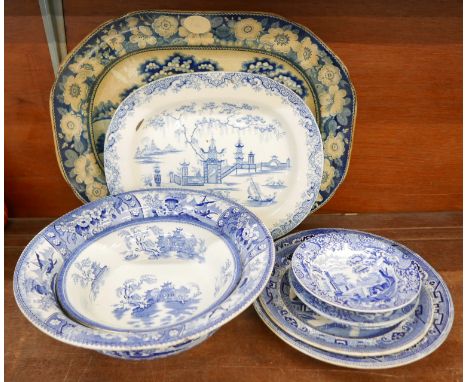 A collection of blue and white china including a meat plate with scene of Nuneham Park, marked Godwin, a bowl marked Canova, 