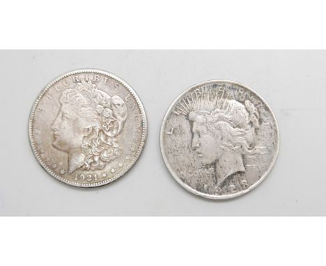 Two silver US Dollars, 1921 and 1928 