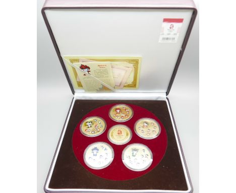 A Beijing Olympics Ltd Young Master Athletics commemorative medallion set, made from gilt copper, no. 23772 