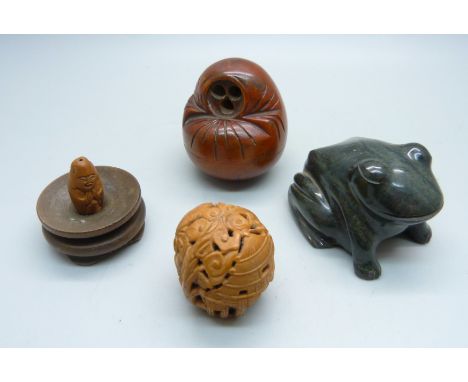 A Cornish Serpentine carved model frog, a carved walnut with Buddha detail, a/f, and a Japanese screw opening carved box cont