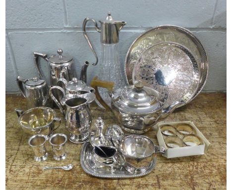 A collection of plated ware, including a cruet set and a three piece tea service **PLEASE NOTE THIS LOT IS NOT ELIGIBLE FOR P