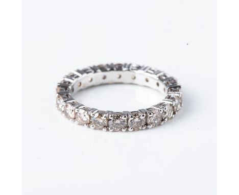 Claw-set with 3,50 carats of round brilliant-cut champagne coloured diamonds, in an 18ct white gold ring, size K-L
