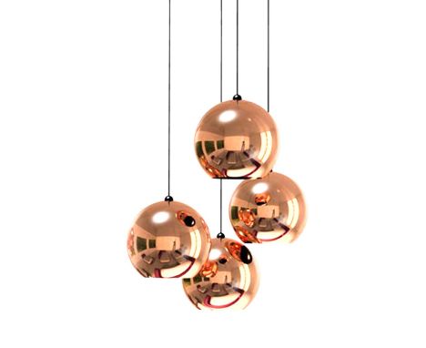 Each polycarbonate orb-shaped shade suspended on a cableTom Dixon (born 1959 in Tunisia) is a self-taught designer who lives 