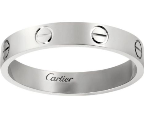 18ct white gold, flat top with screw design, in 18ct white gold, 5mm wide, accompanied by original box and papers confirming 